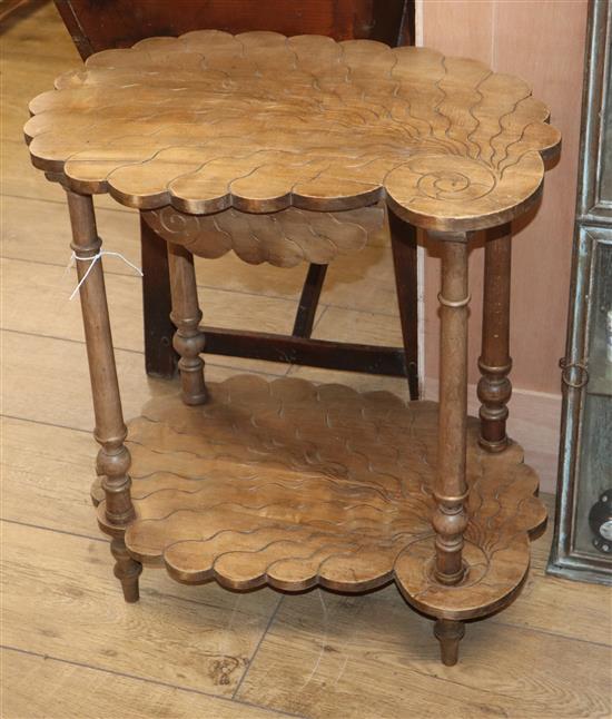 A French two tier shell shaped table W.54cm